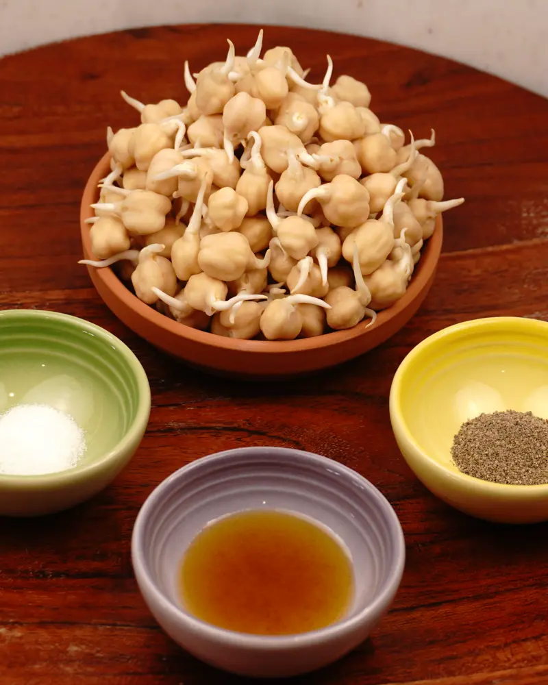 Ingredients for Crunchy Air Fried Sprouted Chickpeas including Sprouted chickpeas, Ghee or coconut oil (vegan), Salt