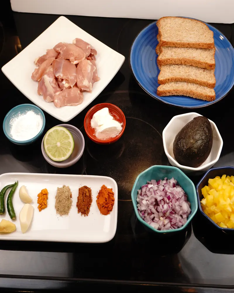 Ingredients for Avocado Chicken Tikka Sandwich including Boneless skinless chicken thighs, Whole milk thick curd, Hass avacado