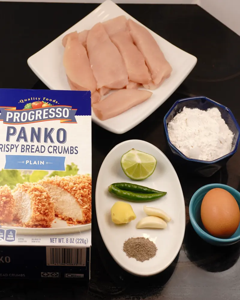Ingredients for Crispy Pan Fried Panko Chicken including Ginger, Skinless Boneless Chicken Breast, Garlic