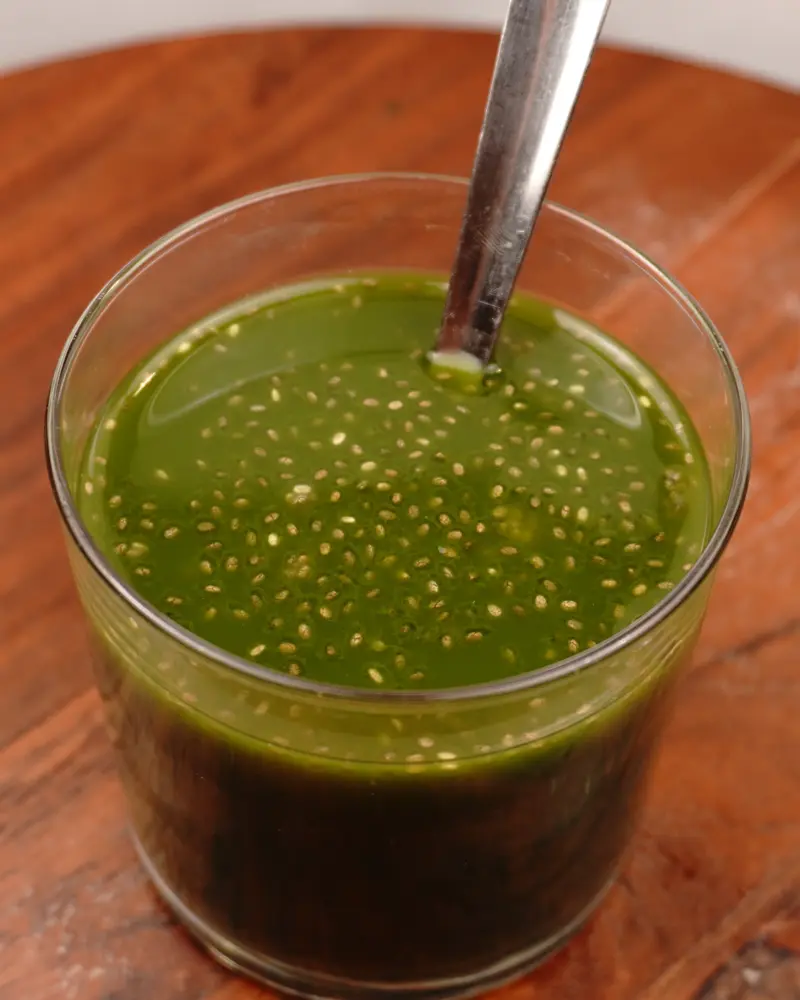 Green Juice With Chia Seeds - close up view of finished dish plated and garnished