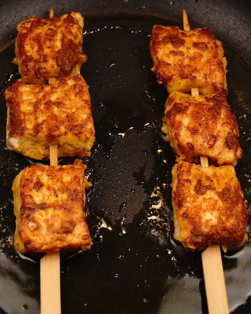 Garlic Fish Tikka (Lasooni Fish Tikka) - close up view of finished dish plated and garnished