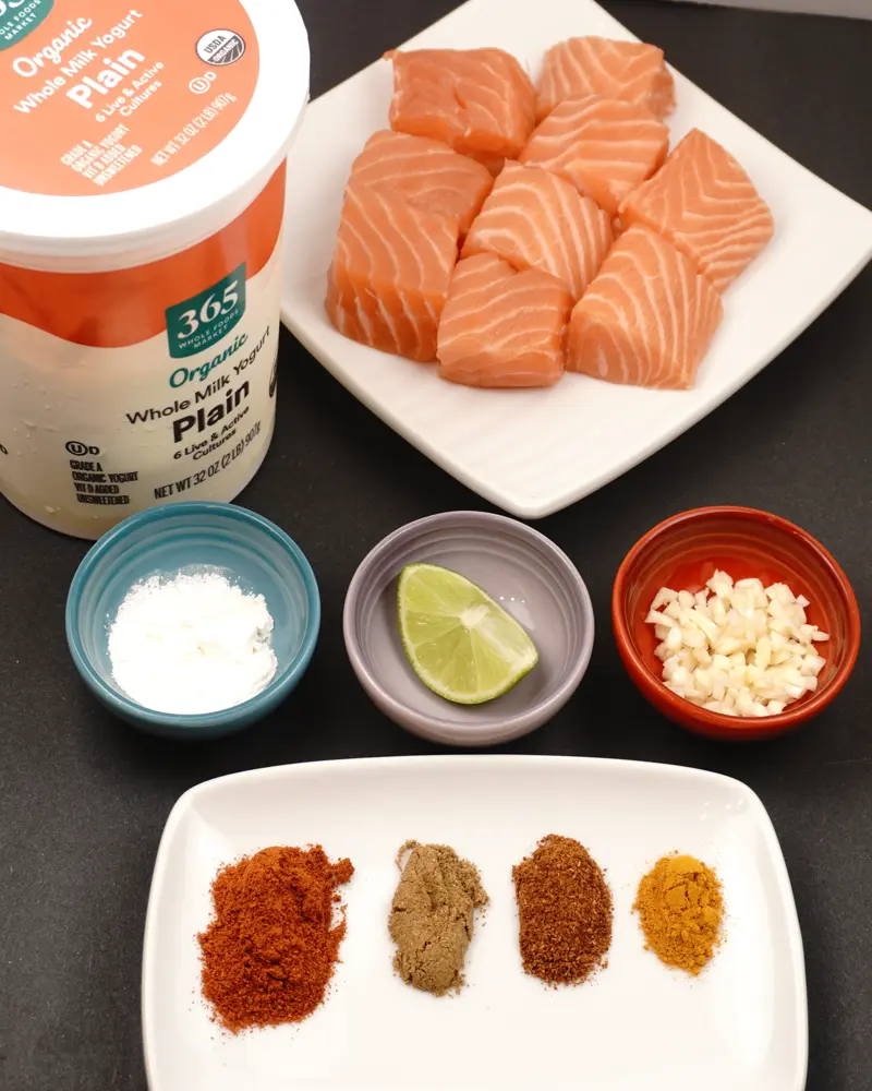 Ingredients for Garlic Fish Tikka (Lasooni Fish Tikka) including Skinless & Boneless fish pieces, Hung Curd, Finely chopped garlic
