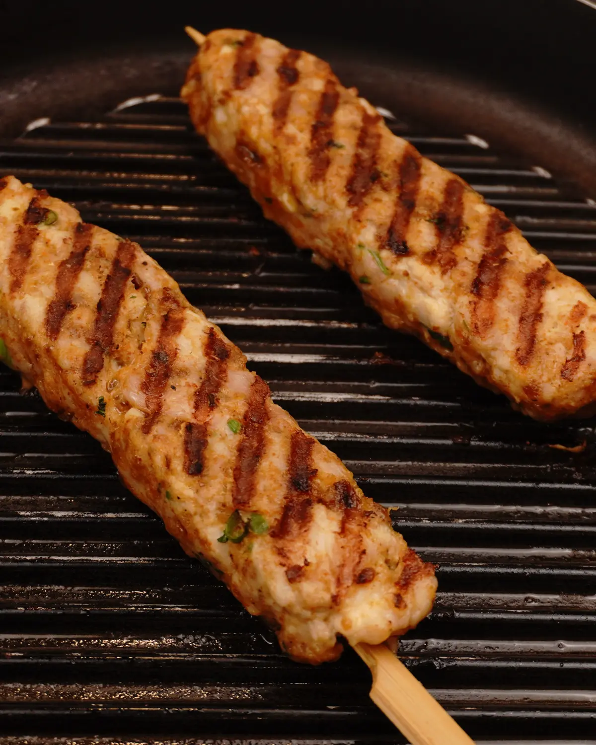 Less Prep time -15 Mins Pan Grilled Chicken Seekh Kebab                - Indian recipe showing finished dish ready to serve