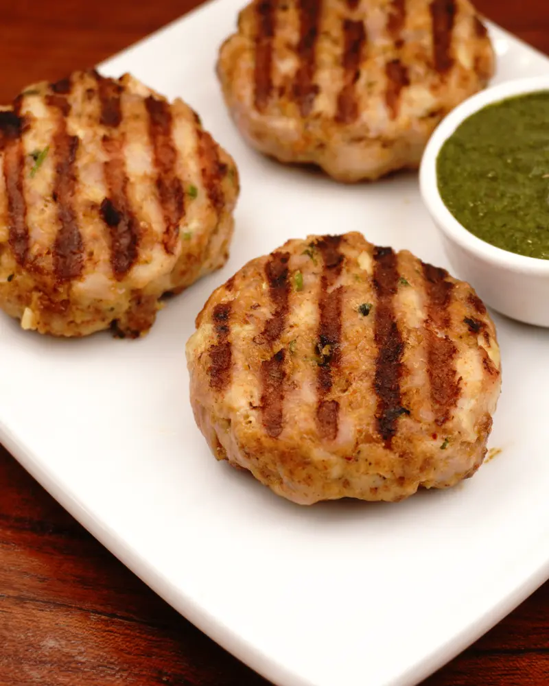 Less Prep Time -15 Mins Pan Grilled Chicken Patty Kebab                - close up view of finished dish plated and garnished