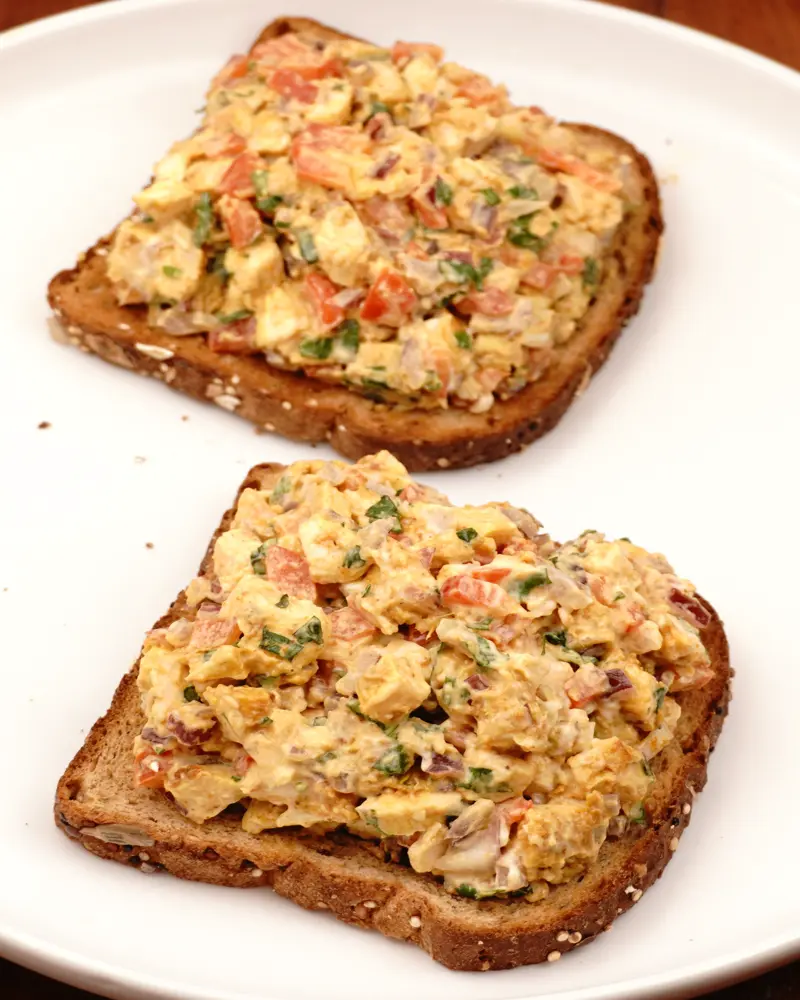 Mayo Chicken Open Sandwich - close up view of finished dish plated and garnished