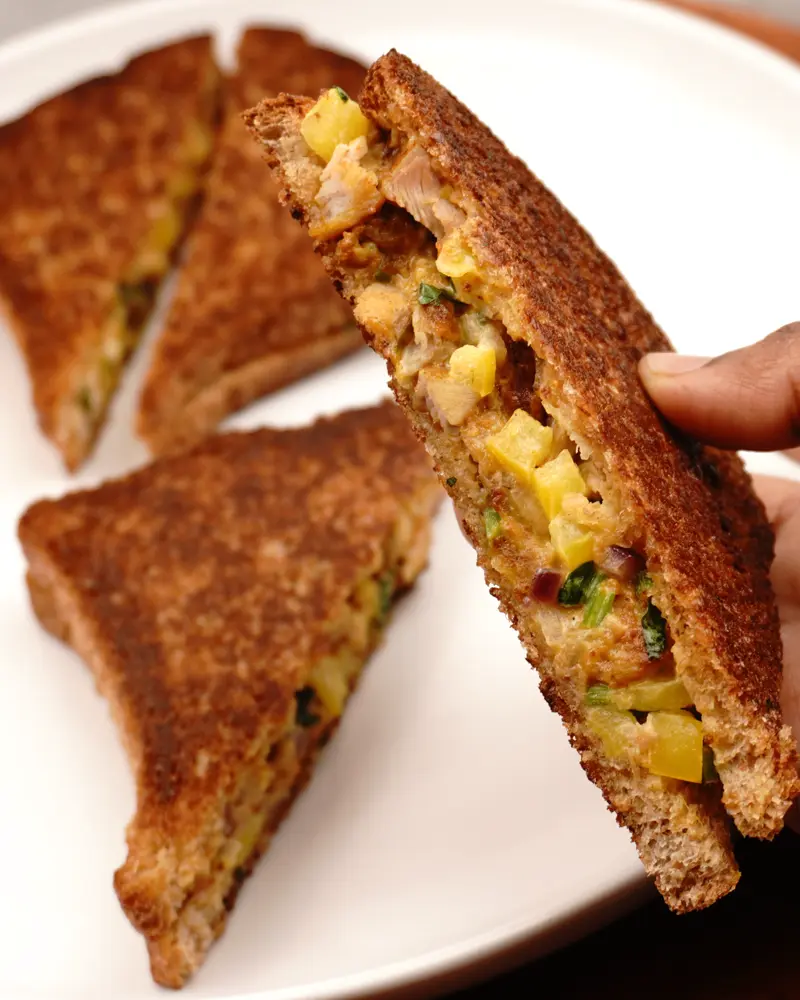 Mayo Chicken Tikka Sandwich - close up view of finished dish plated and garnished