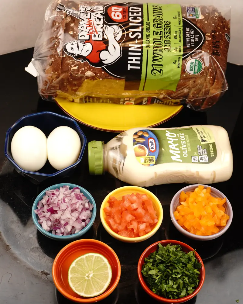 Ingredients for Mayo Egg Veggie Salad Open Sandwich including Whole grain bread, Hard boiled egg, Mayonnaise