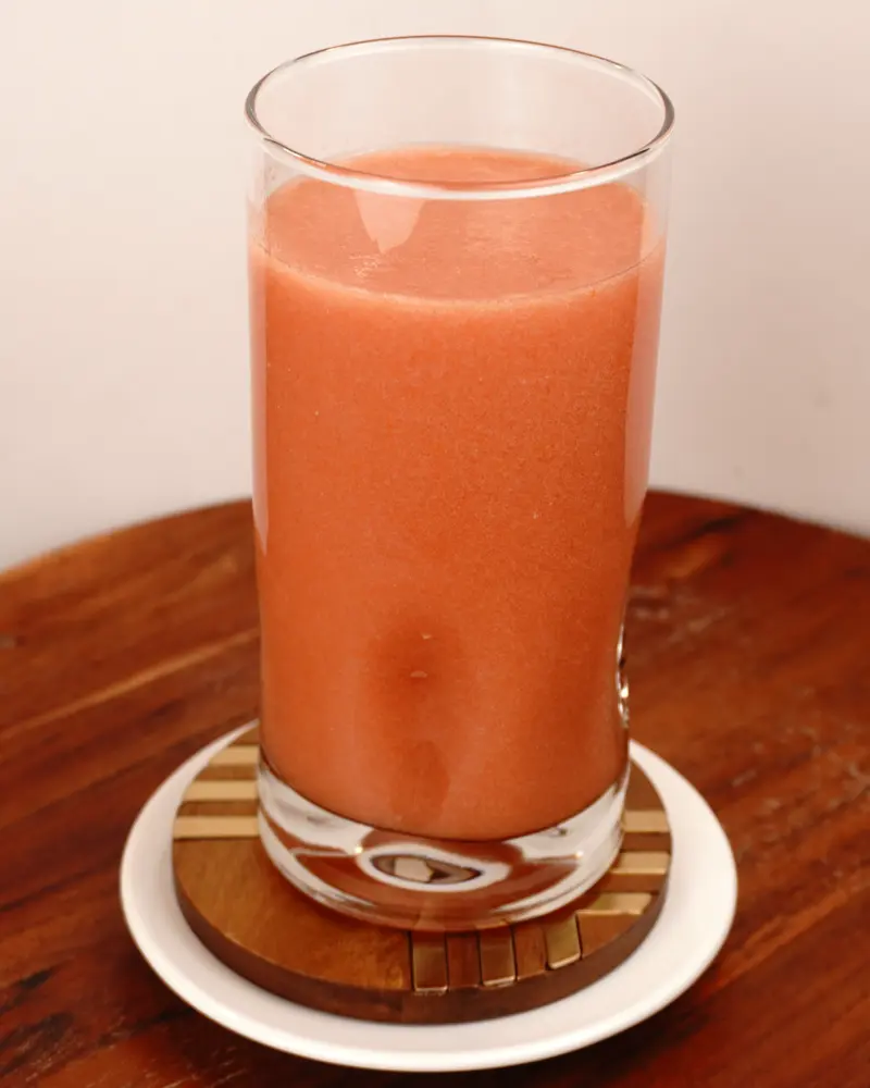 Low Calorie Raw Tomato Smoothie - close up view of finished dish plated and garnished