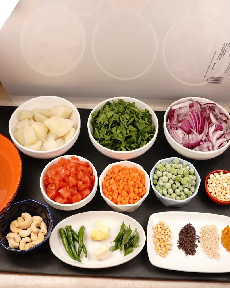 Ingredients for Veggie Poori Masala including Potato, Onion, Tomato