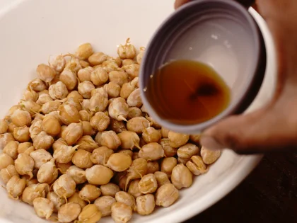 Crunchy Air Fried Sprouted Chickpeas -  Coating with ghee or coconut oil