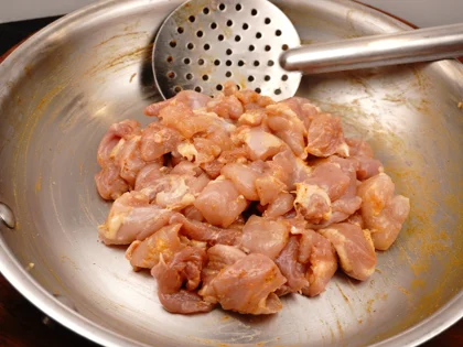 Sprinkle salt & lime juice over the chicken pieces then gently stir with the ladle, to remove the masala bits stuck with the bottom of the pan