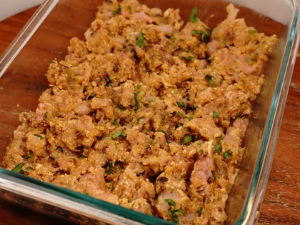 Take the chicken mixture from the refrigerator and roughly divide them in to equal size portions