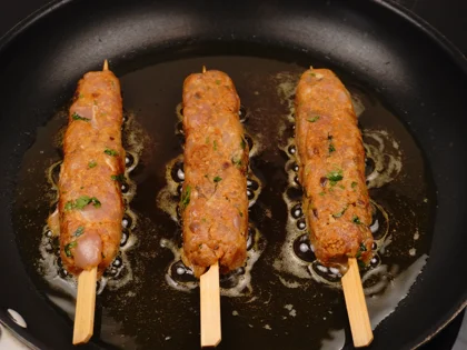 Restaurant Style Chicken Seekh Kebab - Browning the kebabs