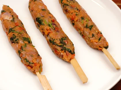  Veggie Loaded Chicken seekh kebab - Gently roll and flatten the mixture on the skewers