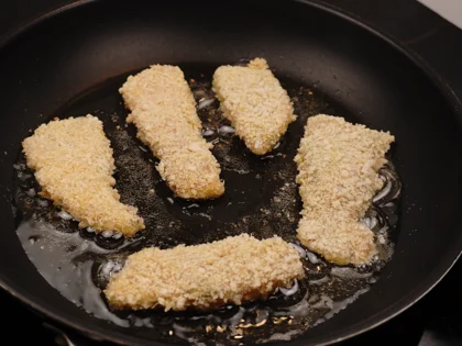 Crispy Pan Fried Panko Chicken -  Frying the First Side