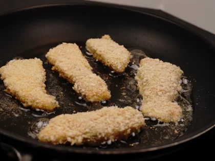 Crispy Pan Fried Panko Chicken -  Frying the First Side