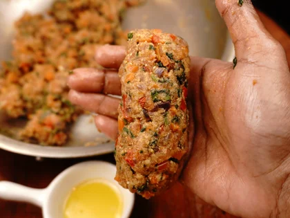 Veggie Loaded Fish Seekh Kebab - Skewer the fish mixture