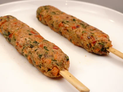 Veggie Loaded Fish Seekh Kebab - Gently roll and flatten the mixture on the skewers