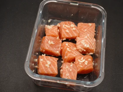 Garlic Fish Tikka (Lasooni Fish Tikka) - Coat the fish pieces and keep aside