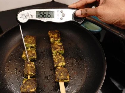 Reduce the heat to low, close pan with lid, continue to cook them for about 2 to 3 minutes