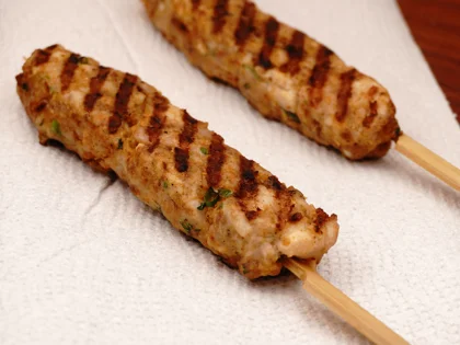 Transfer the grilled chicken skewers to a paper towel lined plate, transfer them to clean plate to rest for at least 5 to 10 minutes before serve