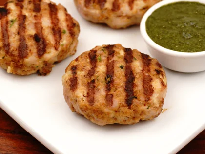 Now the pan grilled chicken patty kebab is ready to be served with curd mint dip     