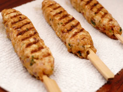 Transfer the grilled chicken skewers to a paper towel lined plate, transfer them to clean plate to rest for at least 5 to 10 minutes before serve