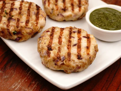 Now the pan grilled chicken patty kebab is ready to be served with curd mint dip     