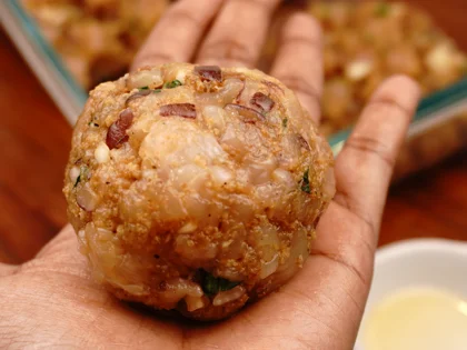 Apply oil on your hands, take one portion of chicken mixture to form a loosely packed ball then lightly flatten the ball at the top to form circular shape chicken patty 