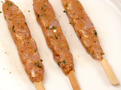 Low Calorie Pan Grilled Chicken Seekh Kebab - Gently roll and flatten the mixture on the skewers