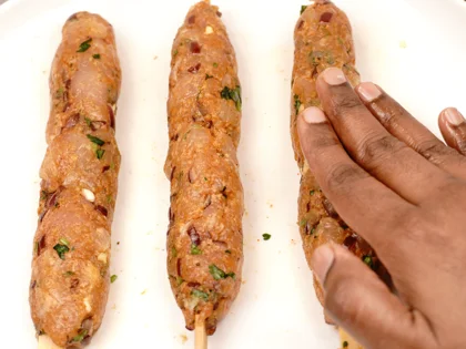 Low Calorie Pan Grilled Chicken Seekh Kebab - Gently roll and flatten the mixture on the skewers
