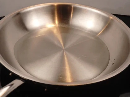 Mughlai Chicken Curry - Preheat a heavy bottomed fry pan then add oil 