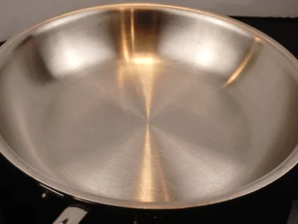 Mughlai Chicken Curry - Preheat a heavy bottomed fry pan then add oil 