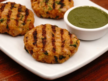 Now the pan grilled chicken patty kebab is ready to be served with curd mint dip         