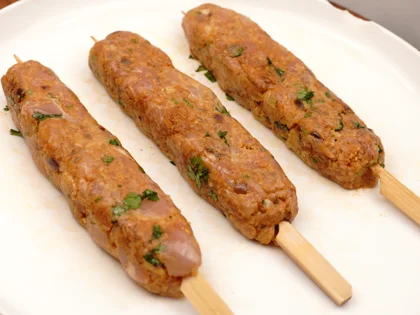 Perfect Pan-Grilled Chicken Seekh Kebab – Restaurant Style at Home - Gently roll and flatten the mixture on the skewers