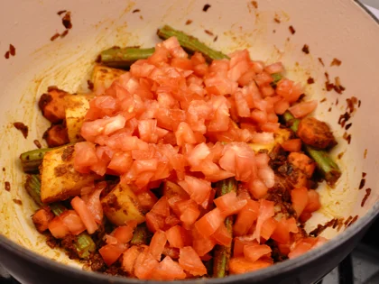 Restaurant Style Vegetable Sambar - Add chopped tomatoes