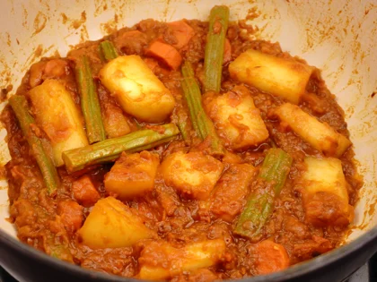 Restaurant Style Vegetable Sambar - Add chopped tomatoes