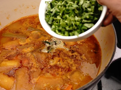 Restaurant Style Vegetable Sambar - Add the tempering and fresh herbs: